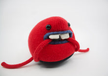 Load image into Gallery viewer, red cute monster toy with pocket mouth and two teeth
