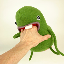 Load image into Gallery viewer, green cute monster plush toy eating persons hand 
