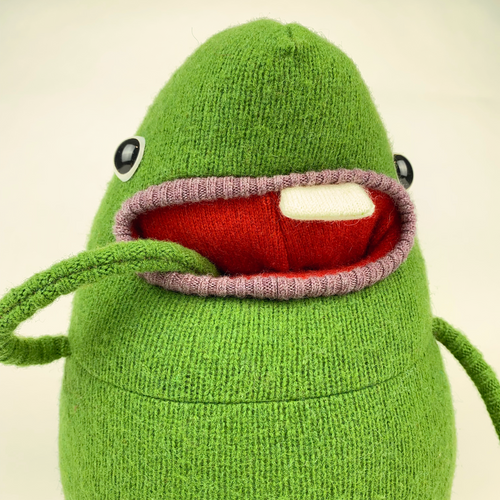 cute green monster doll plush toy with pocket mouth