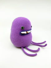 Load image into Gallery viewer, purple stuffed animal with teeth

