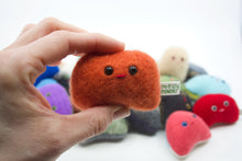 Load image into Gallery viewer, close up of tiny orange stuffed toy with cute face
